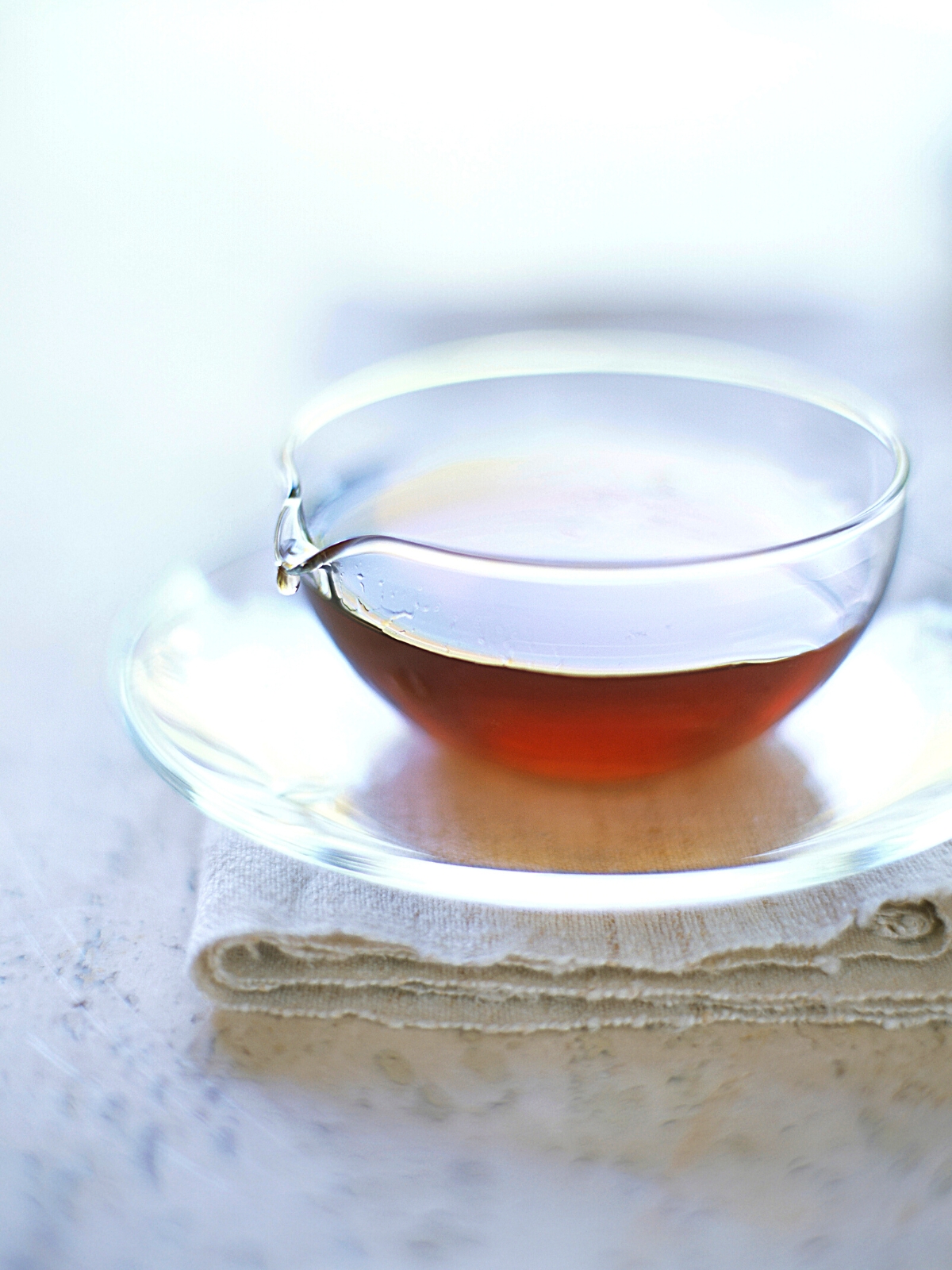 Agave nectar in a glass bowl.