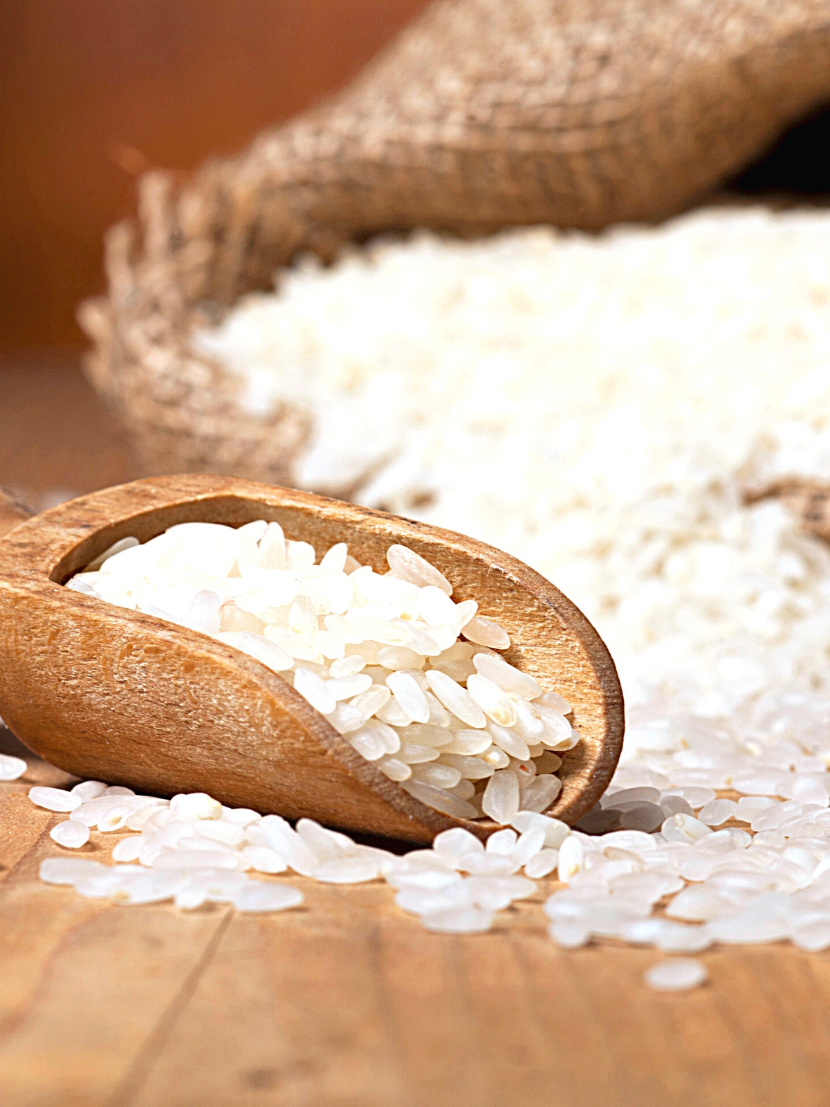 A wooden spoon with Mogra Rice.