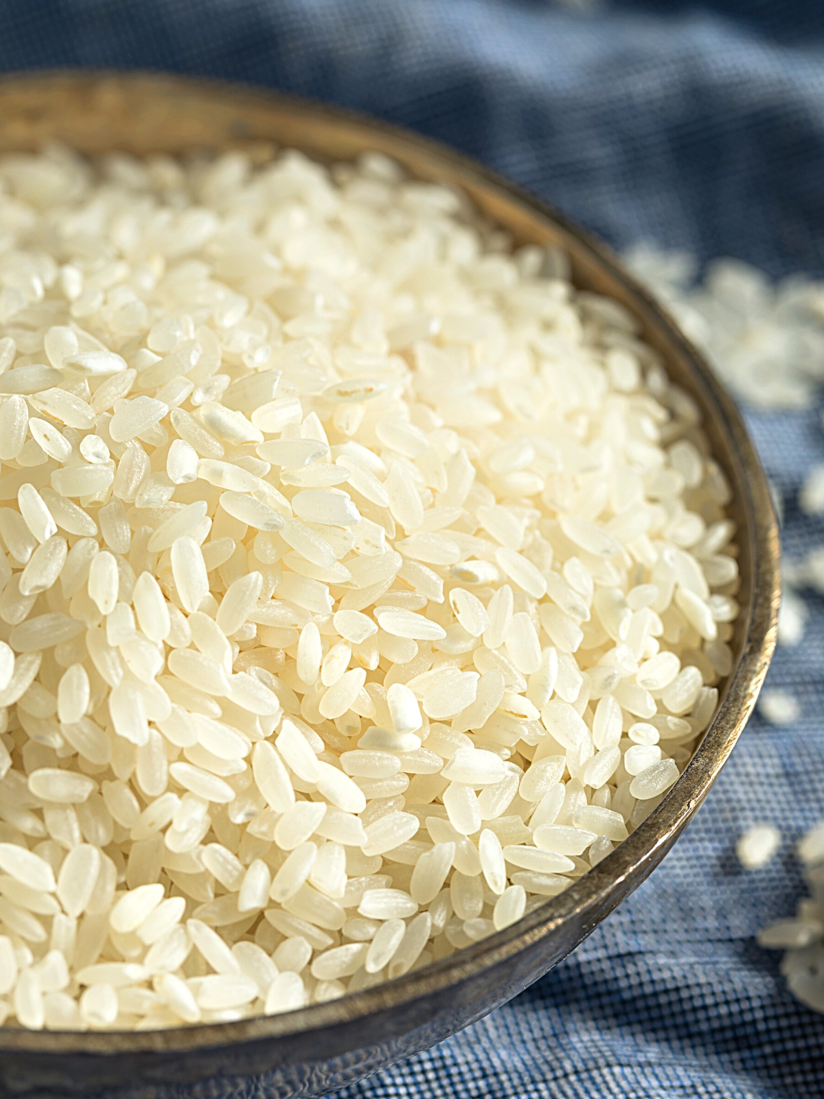 A bowl of Raw Dry Organic Short Grain White Rice.