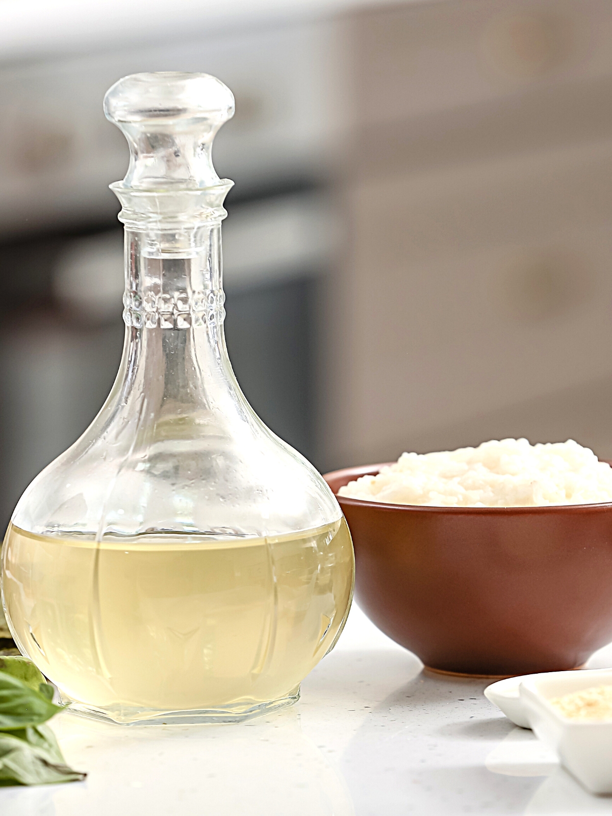 Homemade Rice Vinegar in a glass jar on a Table.