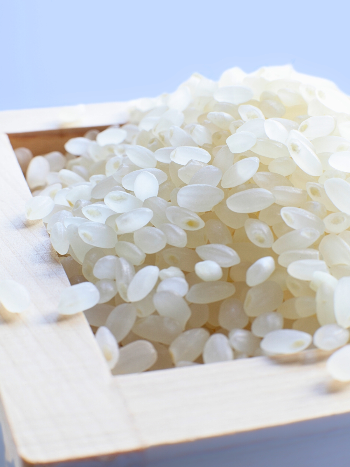 Japanese pearl rice in wooden box.