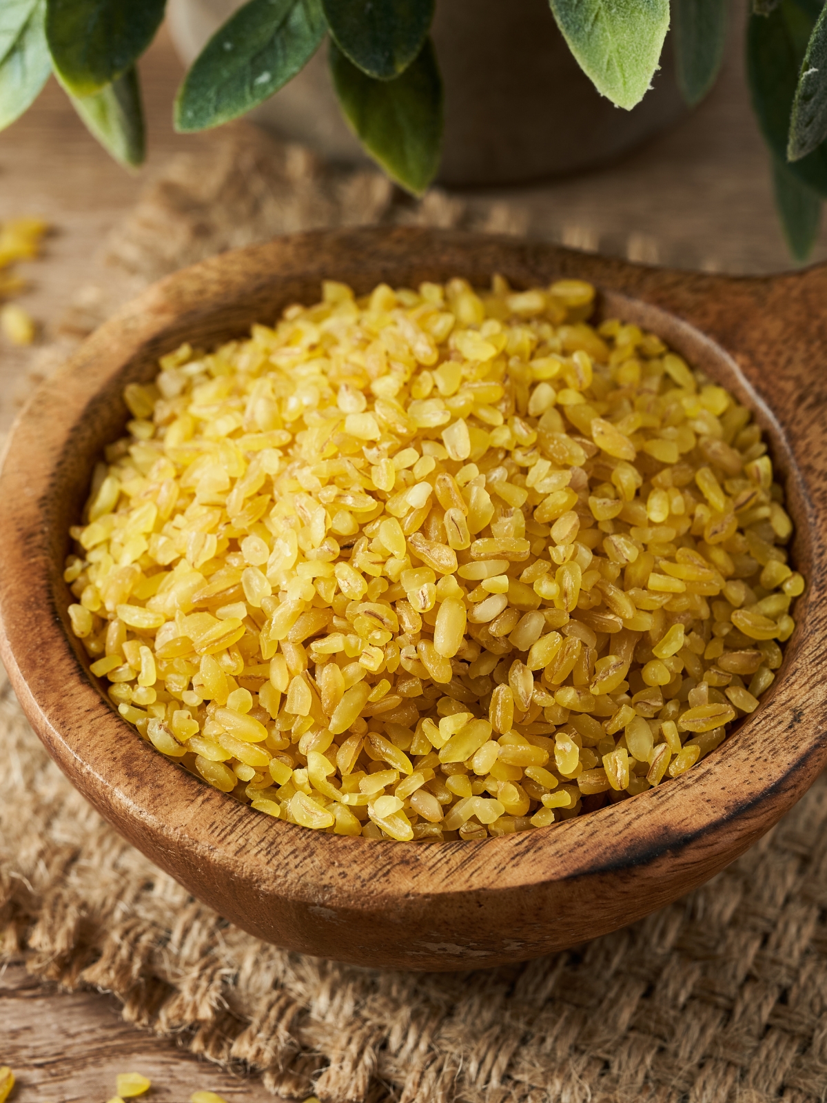 bulgur durum wheat in a large wooden bowl.