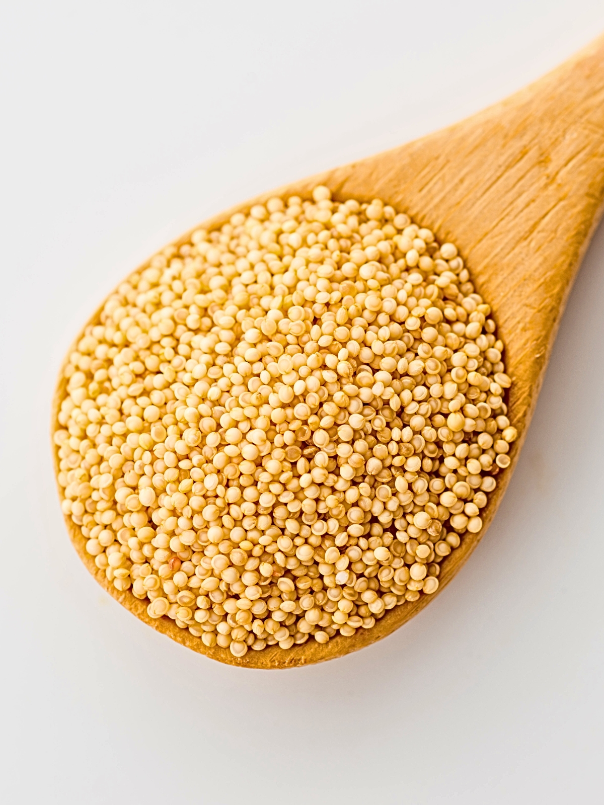 Amaranth Seeds on a wooden ladle.