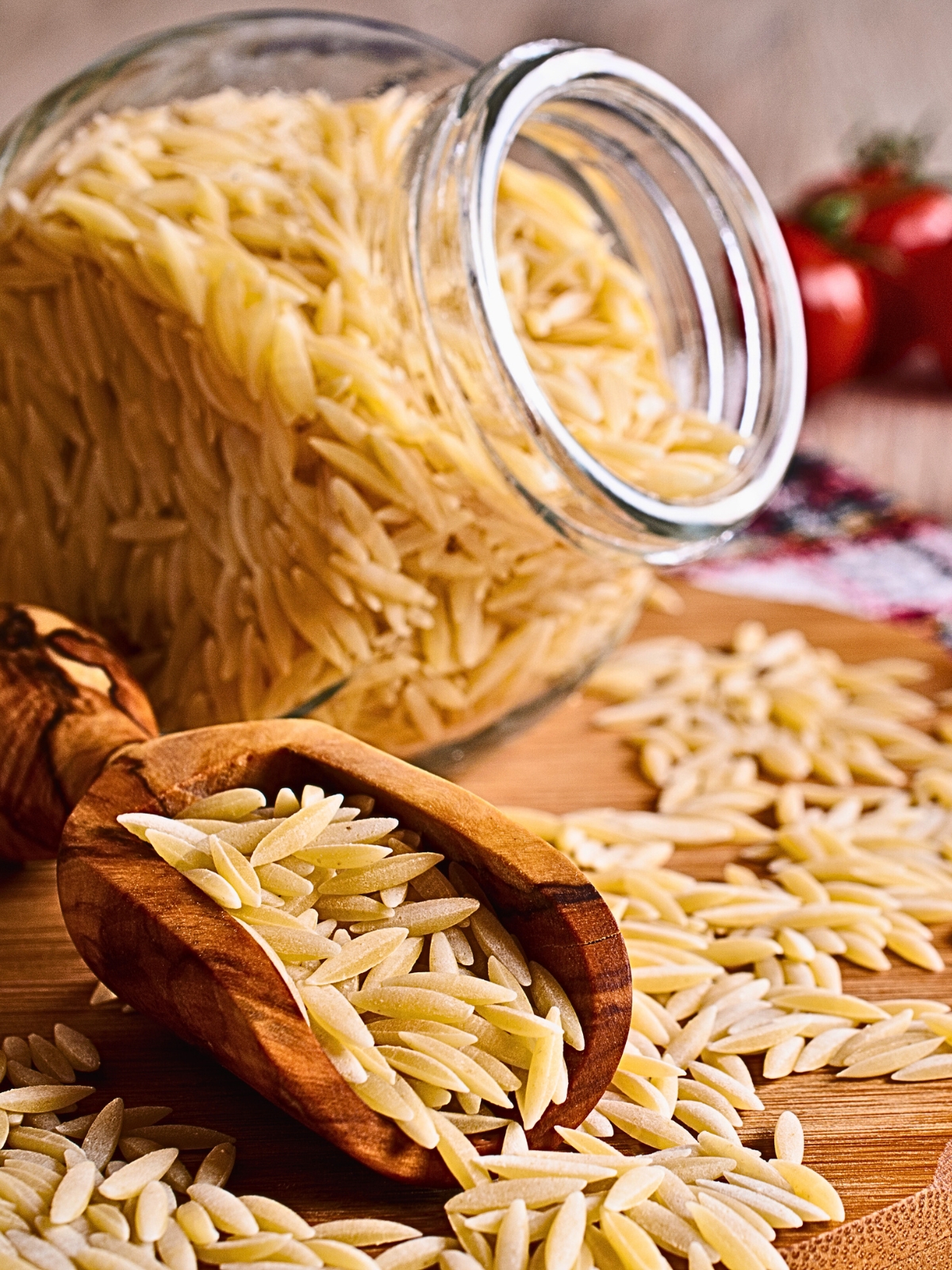 Orzo pasta in a glass jar.