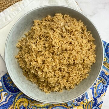 Bowl filled with brown rice pilaf.