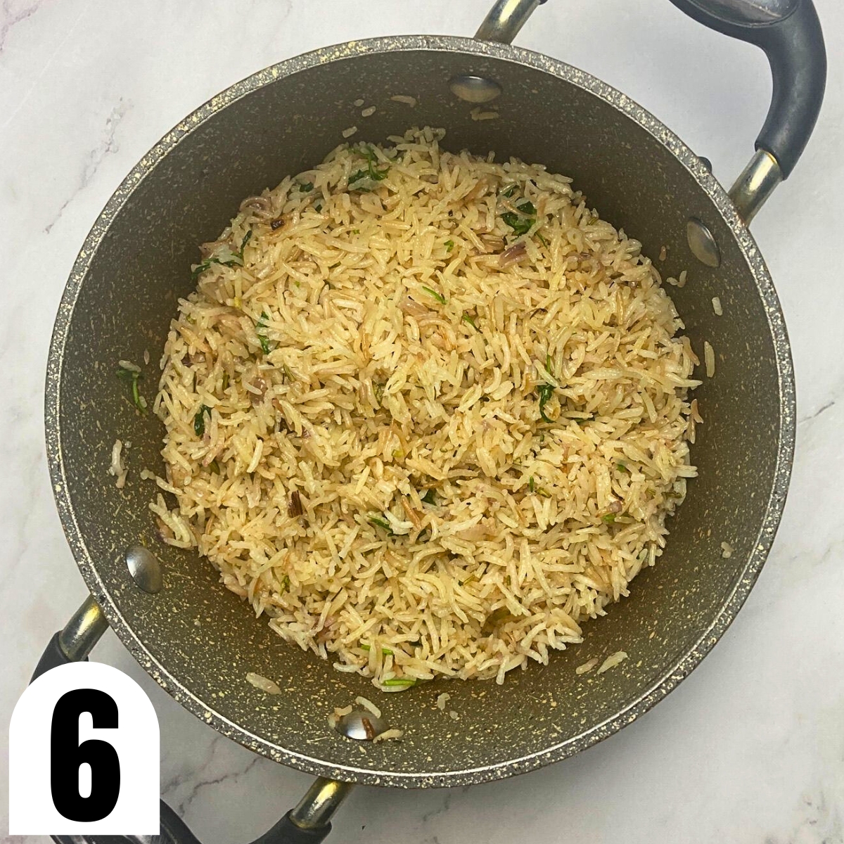 Saucepan with herbed rice pilaf.